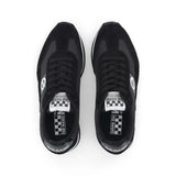 Vue du dessus des baskets noires NO NAME Flex M Jogger montrant les lacets et les languettes à motif damier
