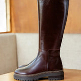 Visuel de profil des bottes hautes en cuir satiné marron coffee BOBBIES FEMME Perry avec semelle chunky crantée