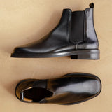 Vue de dessus et de côté des Chelsea boots en cuir noir Grant BOBBIES HOMME