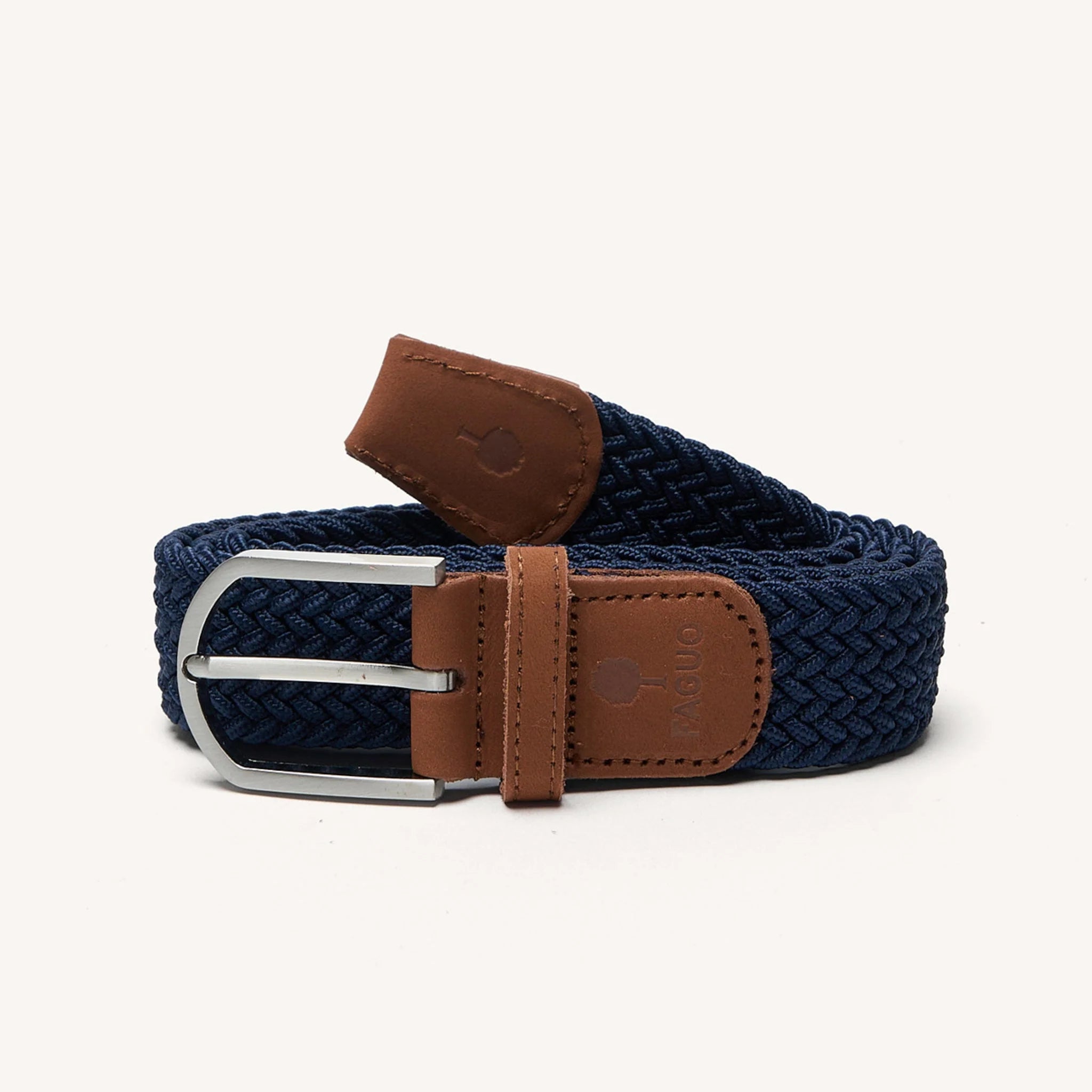 Ceinture tressée élastique bleu marine FAGUO enroulée avec embouts en nubuck marron