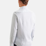 Vue de dos de la chemise cintrée en coton vert SEIDENSTICKER montrant les pinces d'ajustement