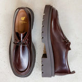 Vue du dessus et de profil des derbies à semelle crantée cabernet BOBBIES FEMME Noreen