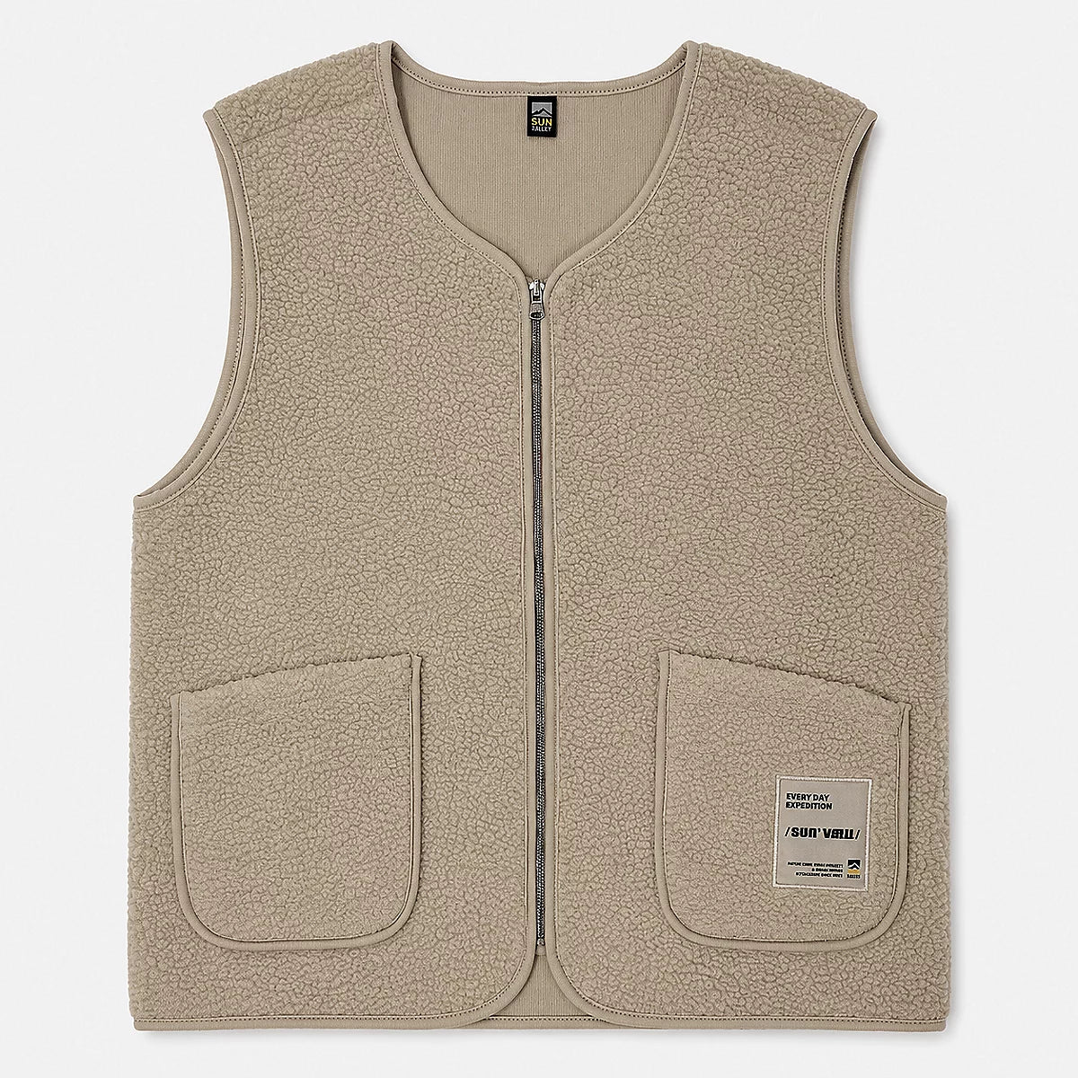 Vue de face du gilet sans manches zippé en maille sherpa beige clair SUN VALLEY FEMME Drago avec poches plaquées