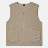 Vue de face du gilet sans manches zippé en maille sherpa beige clair SUN VALLEY FEMME Drago avec poches plaquées