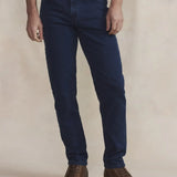 Jean slim indigo pour homme TBS Benjipoc avec ceinture semi-élastiquée porté de face