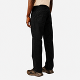 Pantalon chino noir à coupe regular SUN VALLEY HOMME Wolfin porté de dos avec des baskets sombres et un t-shirt beige