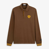 Visuel à plat de face du polo de rugby manches longues marron brownie SERGE BLANCO avec badge cœur jaune