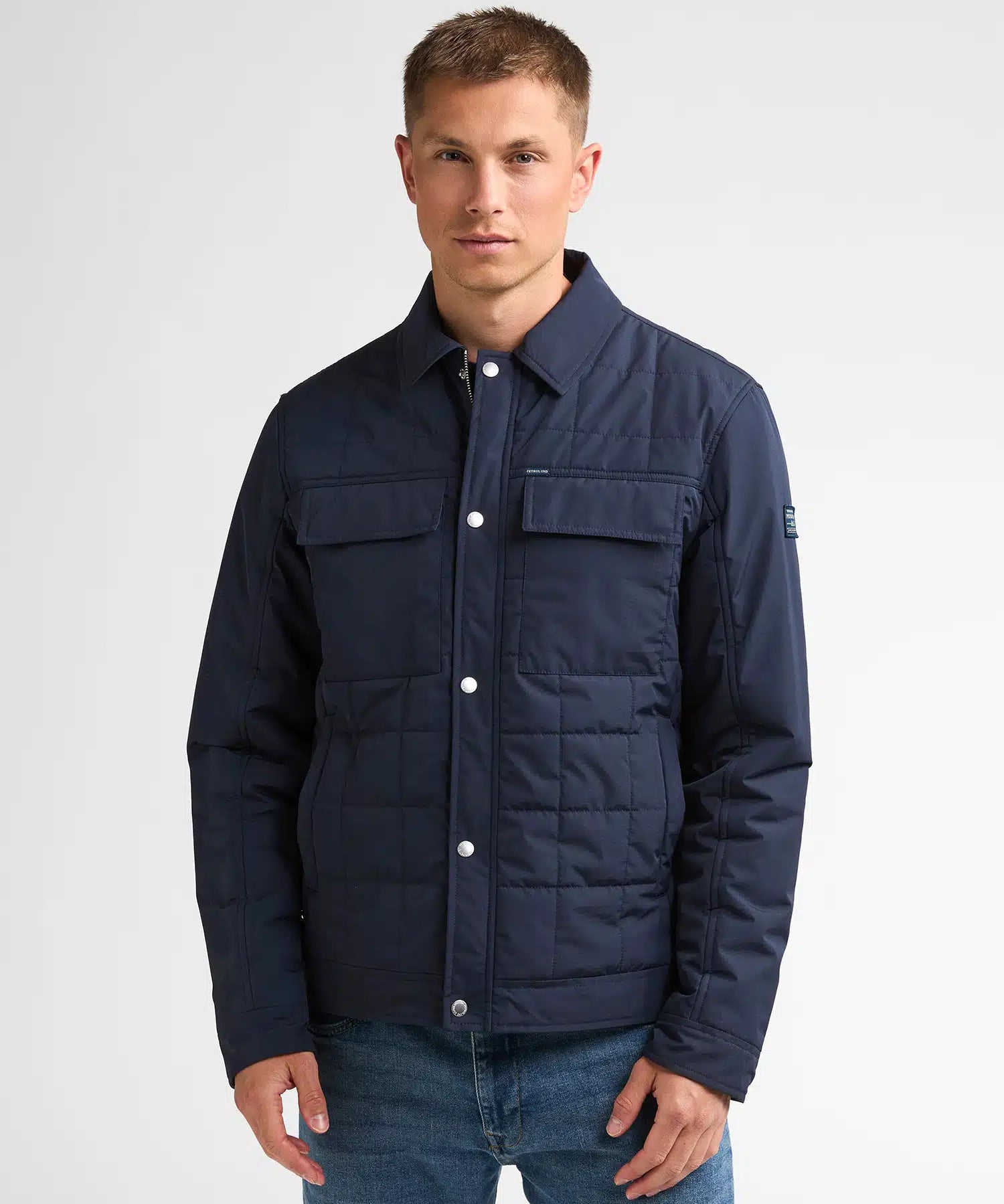 Veste matelassée bleu marine JAC053 PETROL INDUSTRIES fermée portée de face