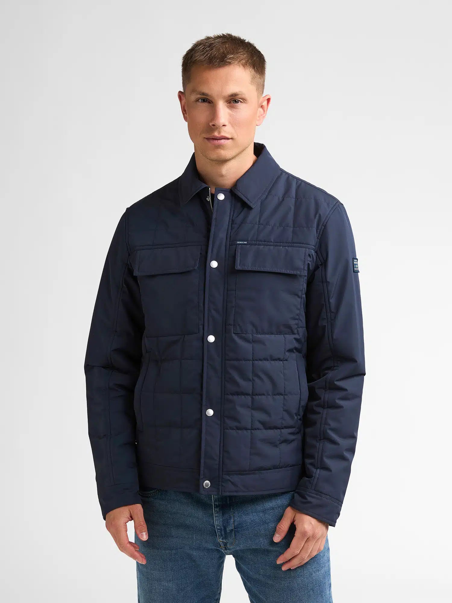 Veste matelassée bleu marine JAC053 PETROL INDUSTRIES fermée portée de face