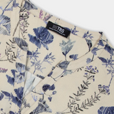 Détail encolure fendue de la blouse femme Noemamis beige à fleurs TBS