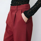 Pantalon NILAY GRACE & MILA – détail des passants boutonnés et de la poche italienne