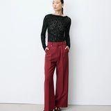 Pantalon large NILAY GRACE & MILA terracotta – porté de face avec haut en dentelle noire