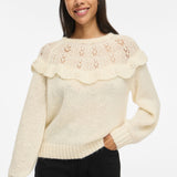 Pull VIMOYANO VILA Birch – porté de face avec pantalon noir
