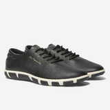 Tennis femme Jazaru TBS noir et blanc en cuir embossé vue de trois quarts